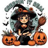 A witch with a floral hat holds a black cat, surrounded by jack-o'-lanterns, bats, and a broomstick. The text reads "CREEPIN' IT REAL" in spooky, stylized letters.