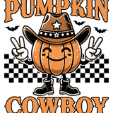 A smiling orange pumpkin wearing a cowboy hat and boots, making peace signs, with bats and a checkered background. Text reads "PUMPKIN COWBOY" in large orange letters.