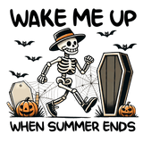 The text reads: "WAKE ME UP WHEN SUMMER ENDS". The illustration shows a smiling skeleton wearing a hat, surrounded by bats, spider webs, jack-o'-lanterns, and coffins, creating a Halloween-themed scene.