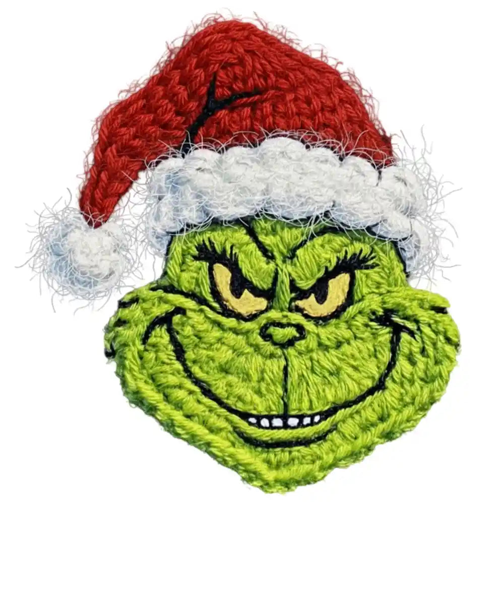 Green grumpy character in red santa hat, hand-embroidered stylized design
