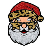 Sparkly Santa Claus face with red glitter hat and leopard print glasses, silver beard
