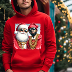 Red hoodie with graphic of Santa and rapper wearing gold chains and sunglasses near Christmas tree