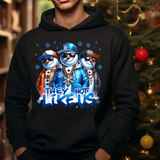 Black hoodie with three stylized snowmen wearing baseball caps and sunglasses, text reads they not like us