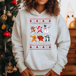 White hoodie with Christmas-themed graphic featuring dancing Santa, reindeer, snowman, and penguin characters