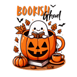 A cute ghost reading a book inside a jack-o'-lantern mug, surrounded by autumn leaves, bats, and a steaming coffee cup. Text reads: "BOOKISH Ghoul" in orange and black lettering.