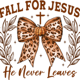 A leopard-print bow with a pumpkin center, surrounded by leaf motifs and a cross. Text reads: "FALL FOR JESUS He Never Leaves" in brown tones.