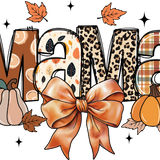 The word "Mama" stylized with autumn-themed patterns including leopard print, plaid, and leaf motifs, adorned with a large orange bow, maple leaves, and pumpkins.
