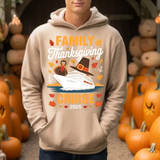 Beige hoodie with Thanksgiving cruise design featuring turkey, cruise ship, autumn leaves, and pumpkins
