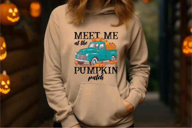 Beige hoodie with teal vintage truck and pumpkins, text reads Meet Me at the Pumpkin Patch